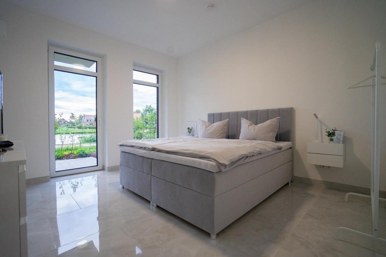 Tomkes Ferienwohnung Am See Rhauderfehn Kültér fotó